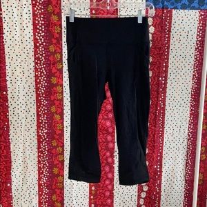 Cropped blacked lululemon leggings with mesh panel